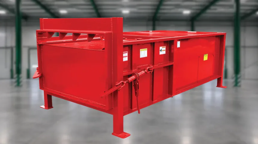 Stationary trash compactor in a warehouse