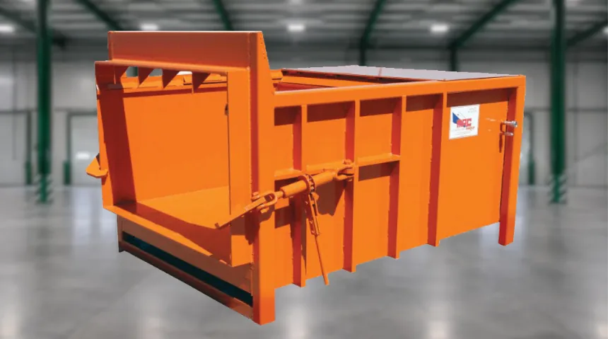 Short-body stationary compactor in a warehouse
