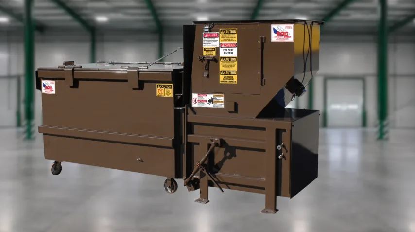 Apartment trash compactor with a top feed hopper, in a warehouse