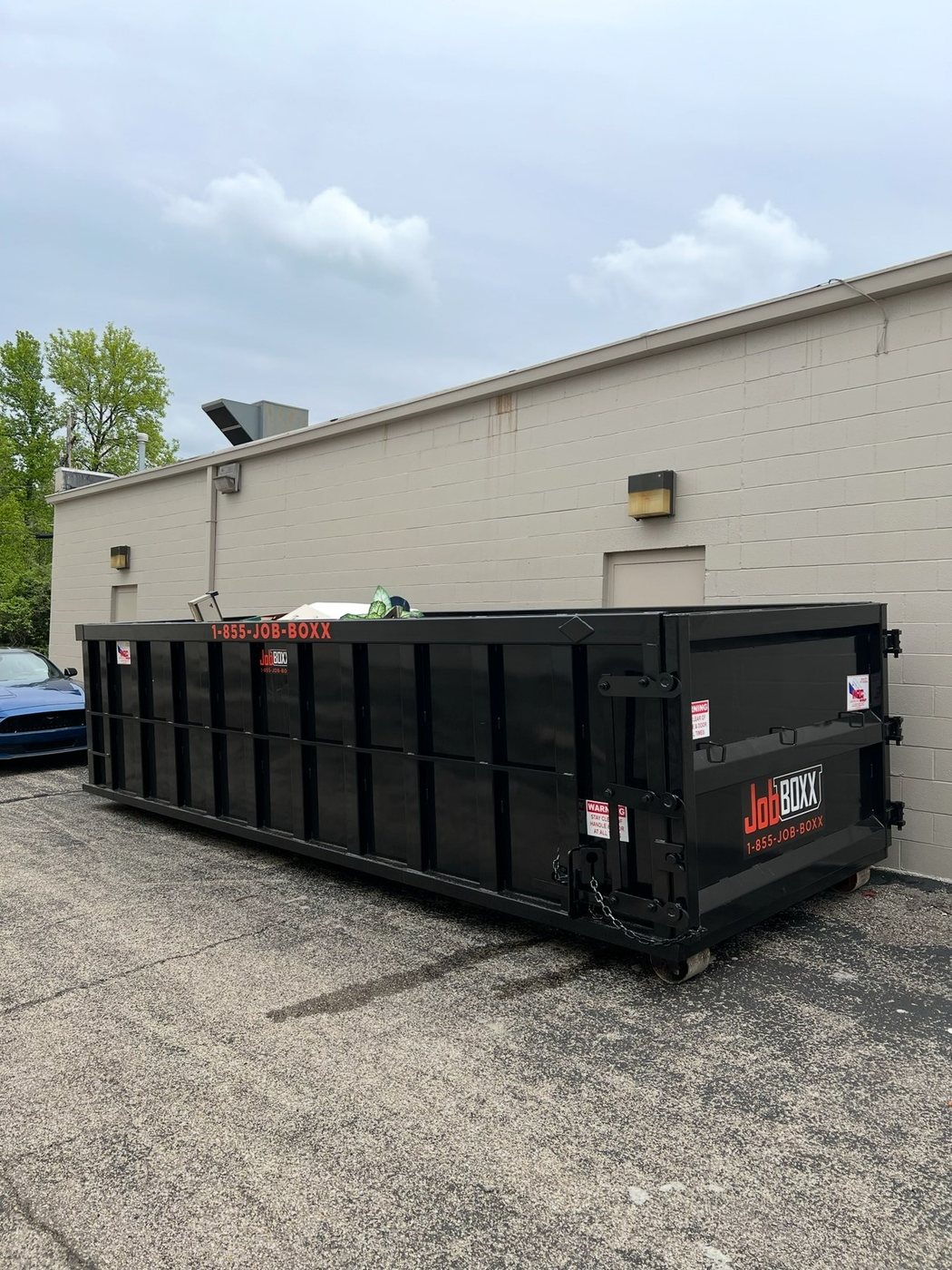 Roll-off container at a commercial building